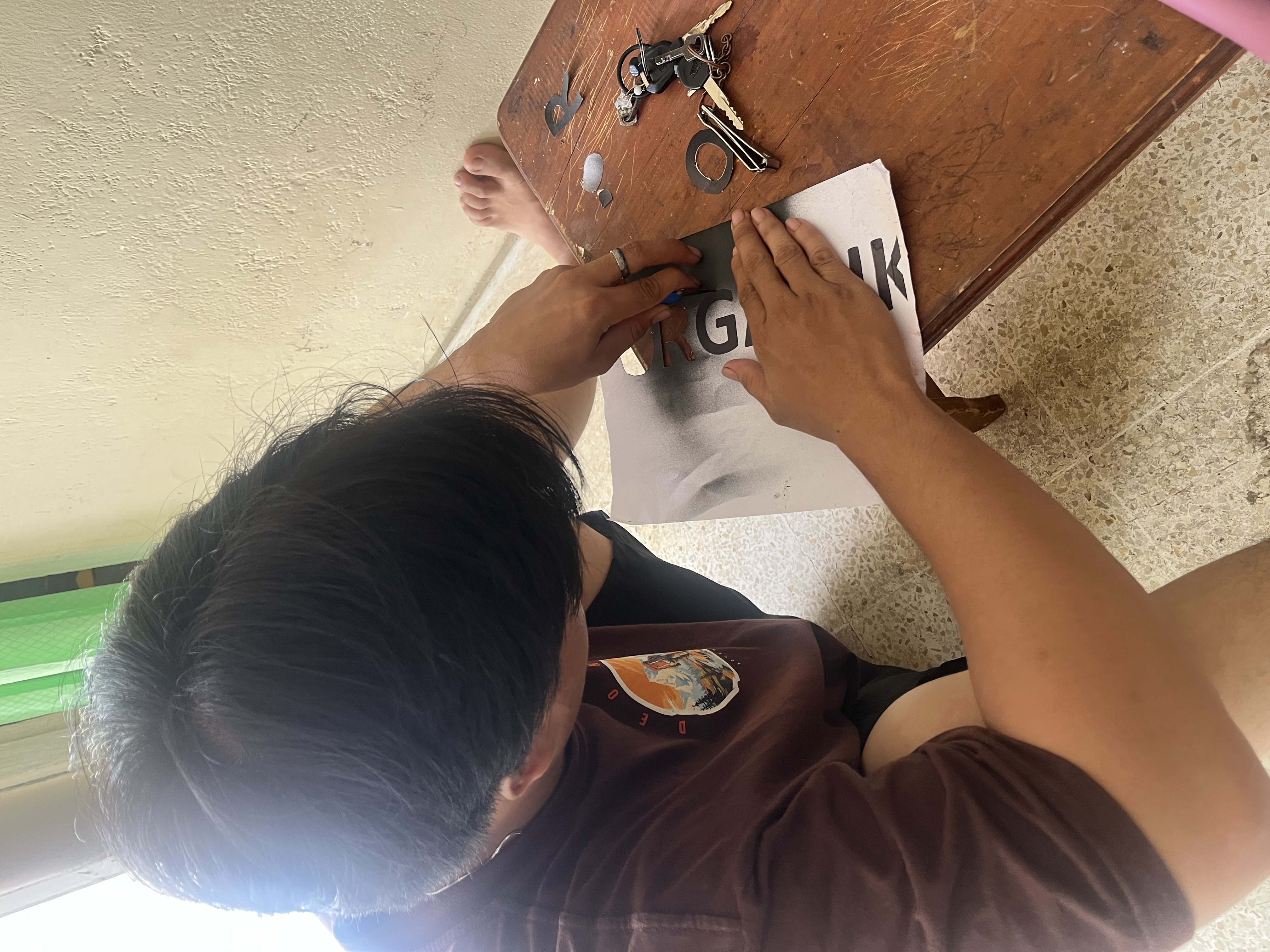 Pemotongan nama untuk tulisan tong sampah