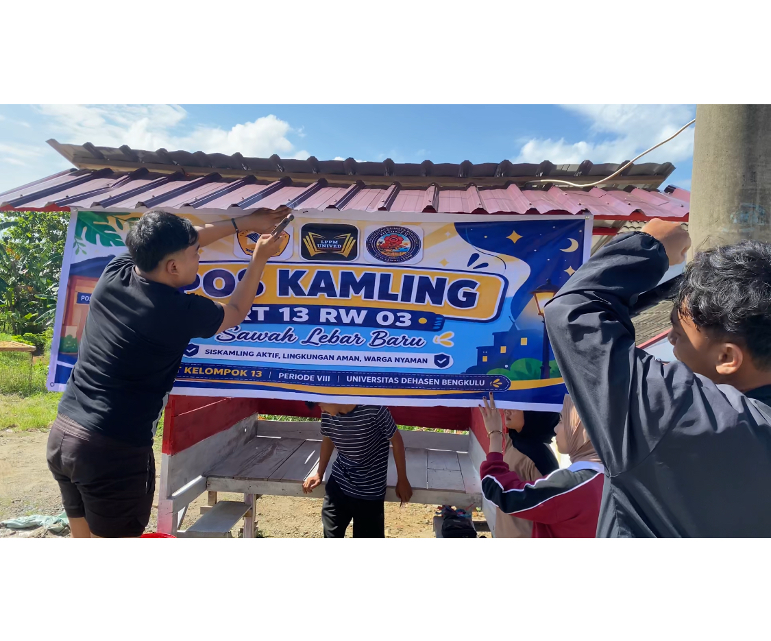 Pemasangan spanduk pos kamling