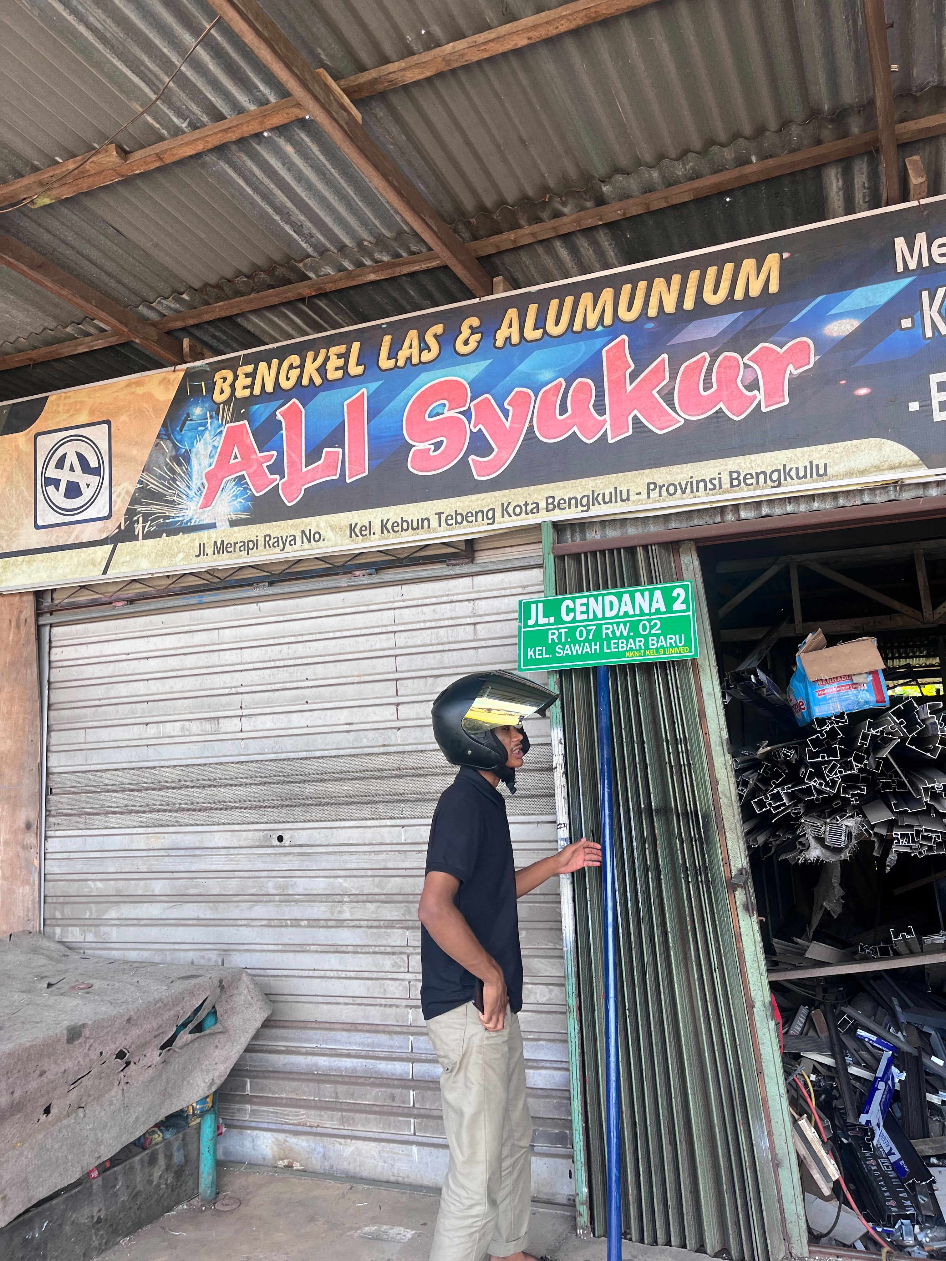Pengambilan Palang Nama RT 07 KKN Kelompok 9