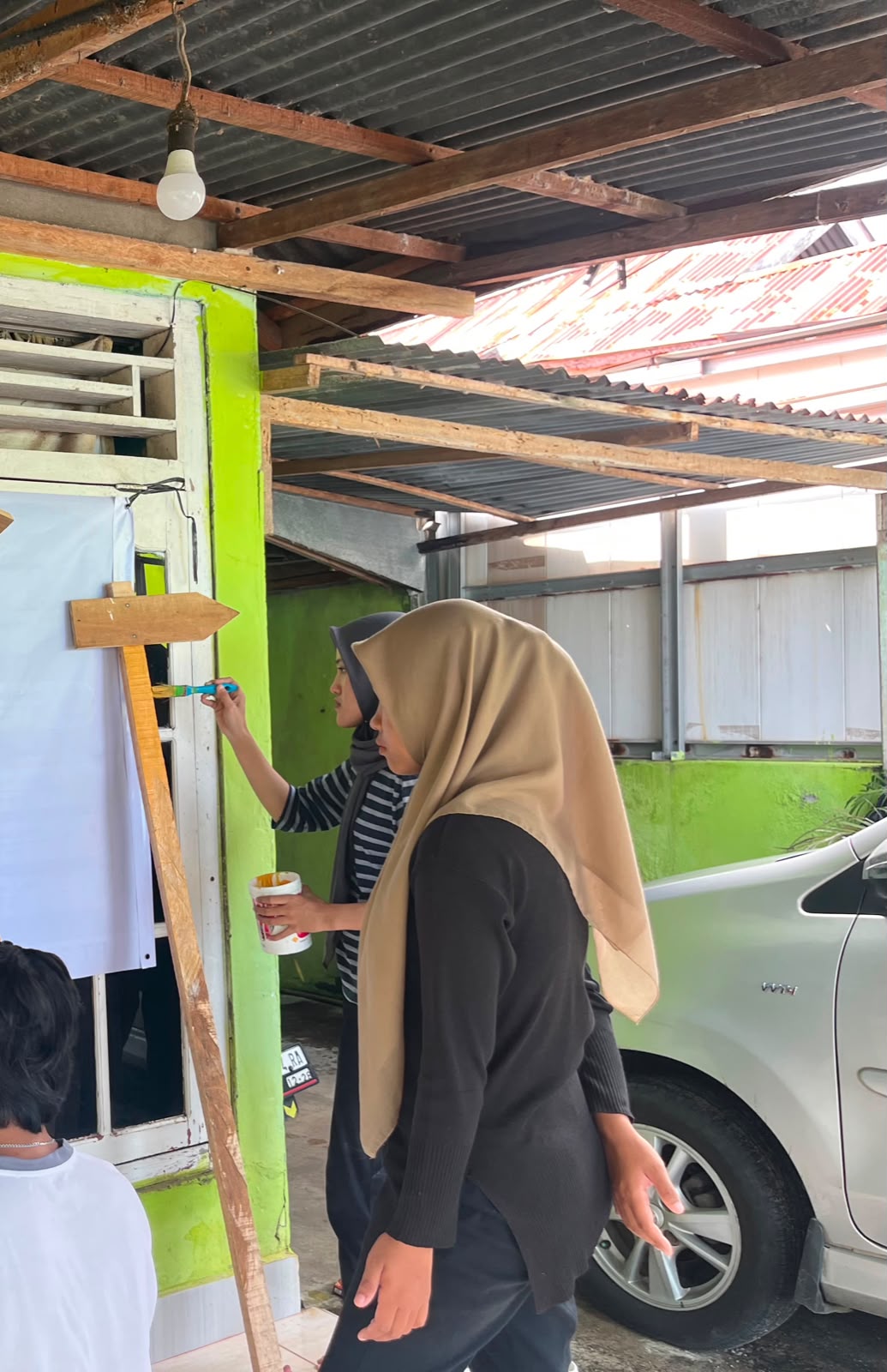 pengecatan papan petunjuk jalan 