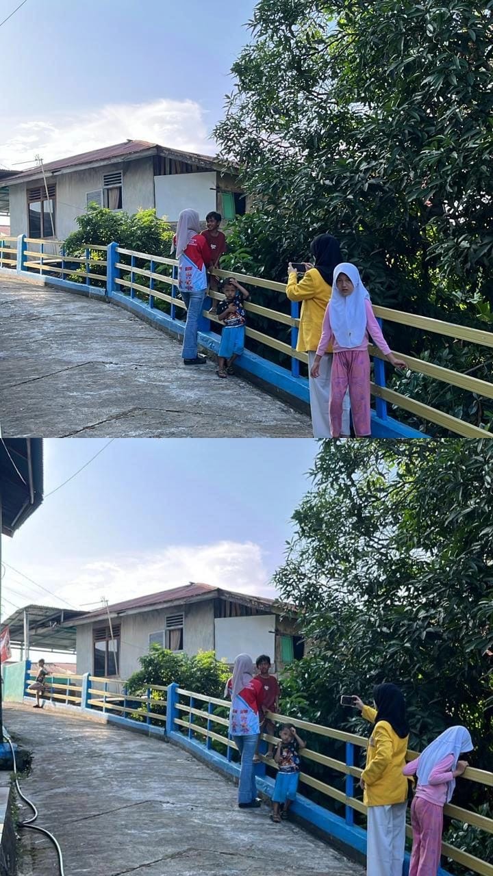 Bermain dan berinteraksi dengan anak-anak posko kelompok 9