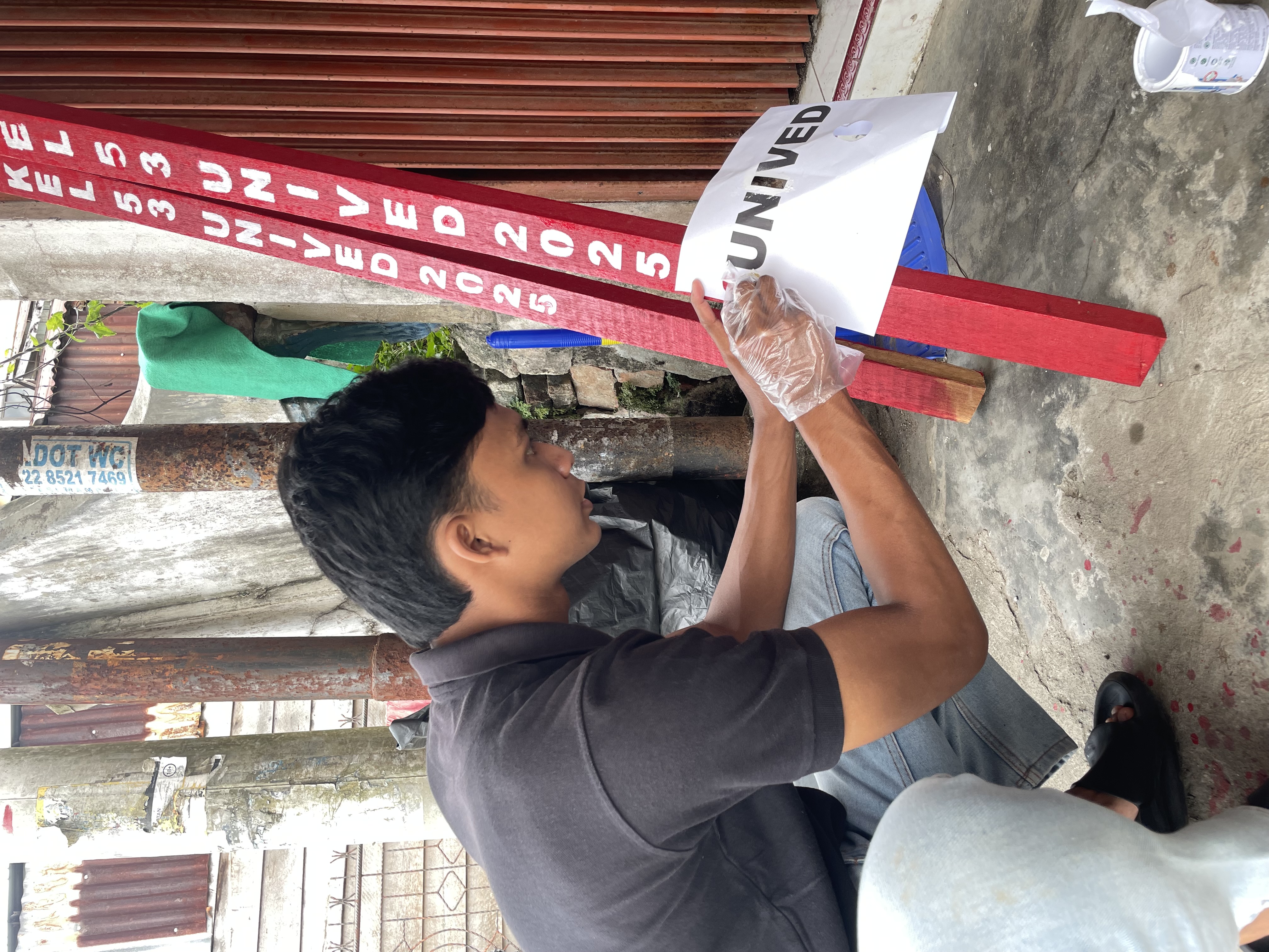 Merapikan tulisan proker plang gang