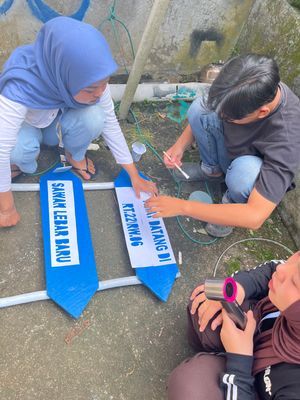 Mewarnai proker Plang perbatasan RT